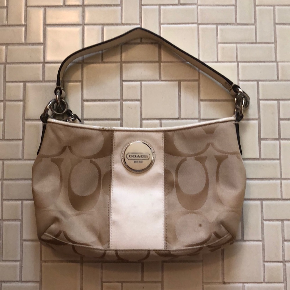 Tan Coach Purse. (One small brown spot on front)